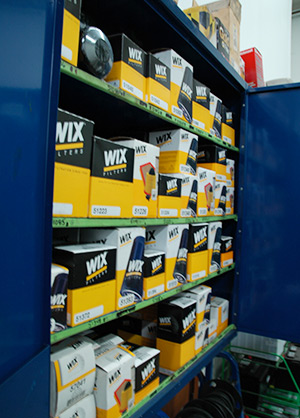 Supply shelf displays quality parts, fluids, and filters for vehicle maintenance